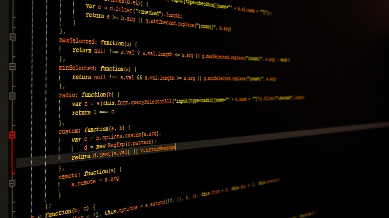 Lines of Rust programming language code displayed on a developer's monitor.