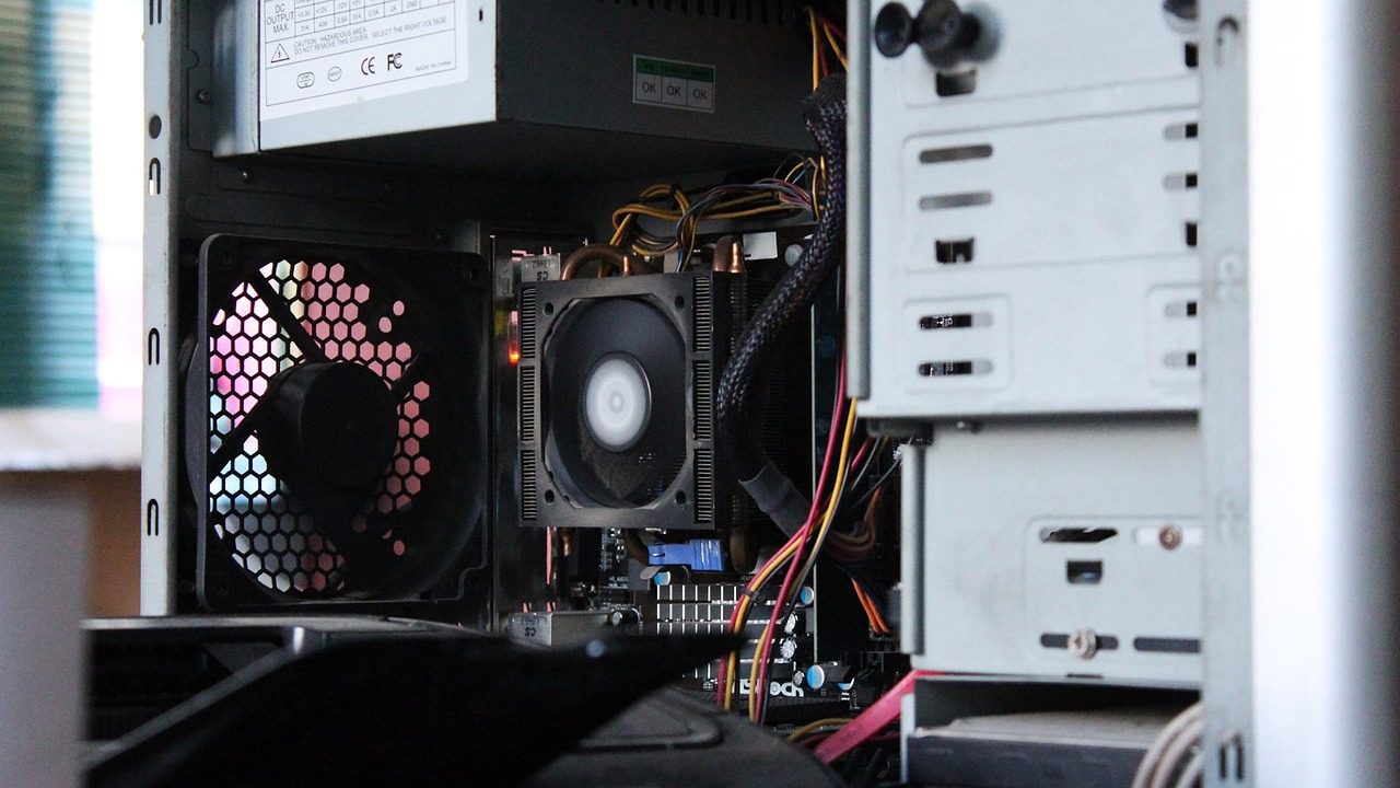 Close-up of an aged laptop motherboard with visible chips and circuitry.