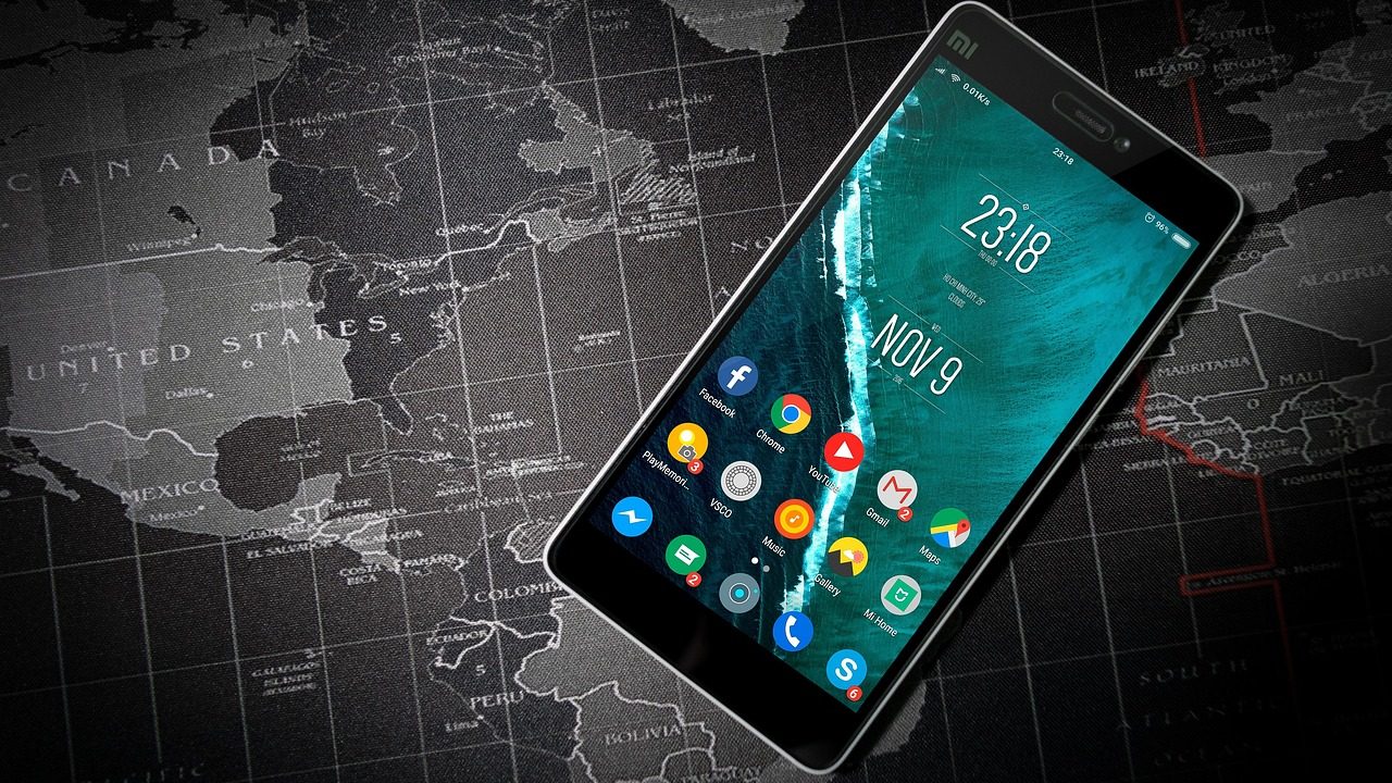 A close-up of a smartphone screen displaying a lock icon and security prompt.