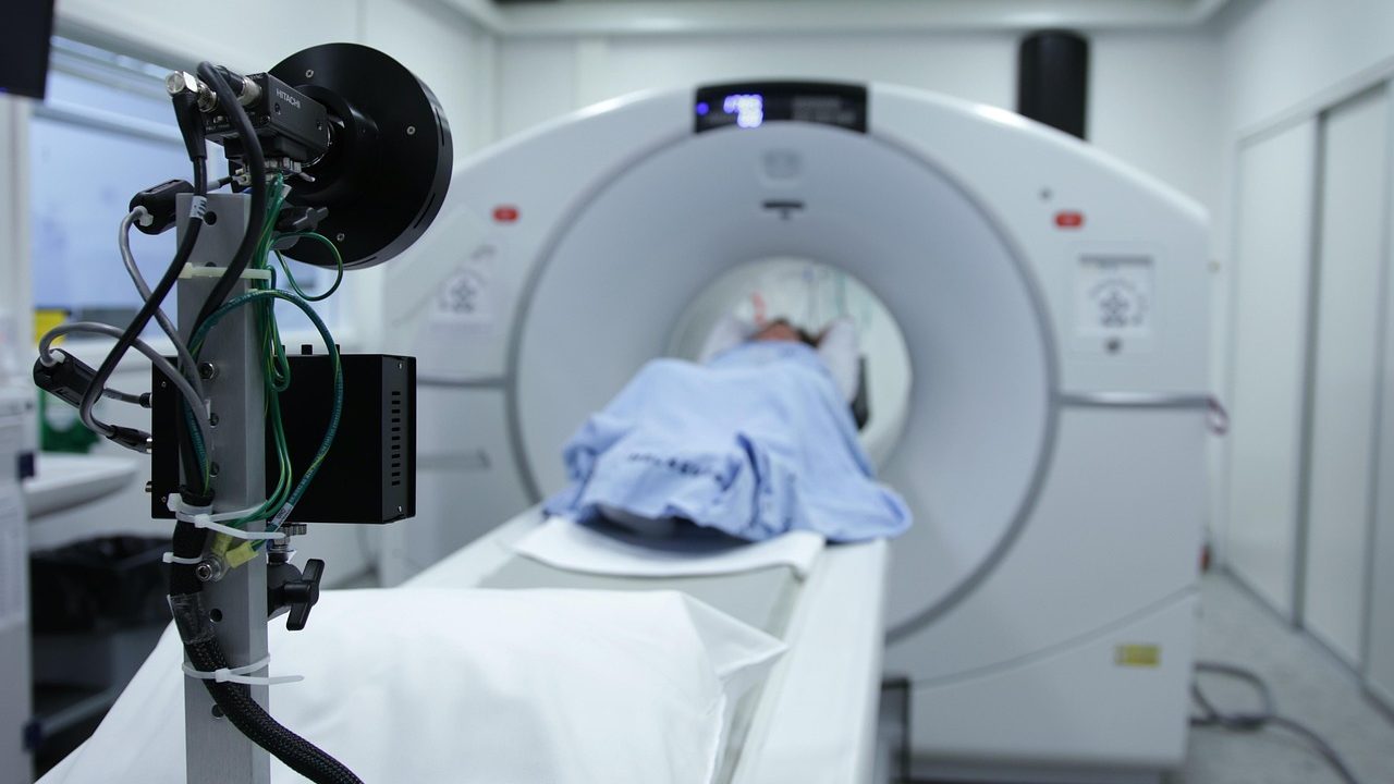 A glowing medical scan displayed on a diagnostic monitor in a clinical setting.
