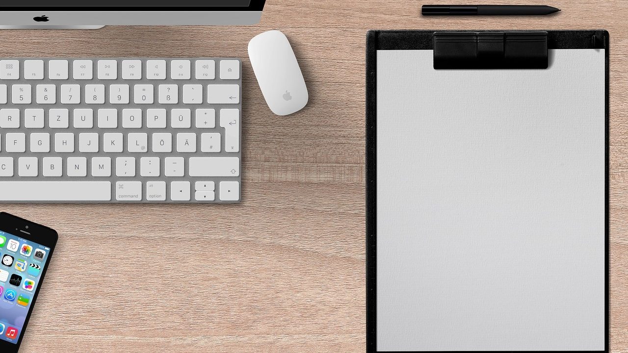 A developer's workstation with a command-line terminal open on the monitor.