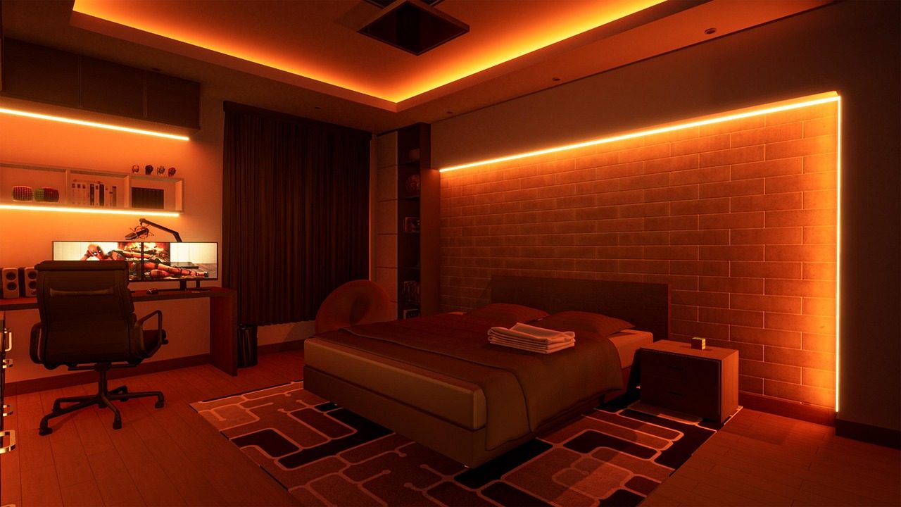 A desktop computer with glowing peripherals and multiple monitors on a home office desk.