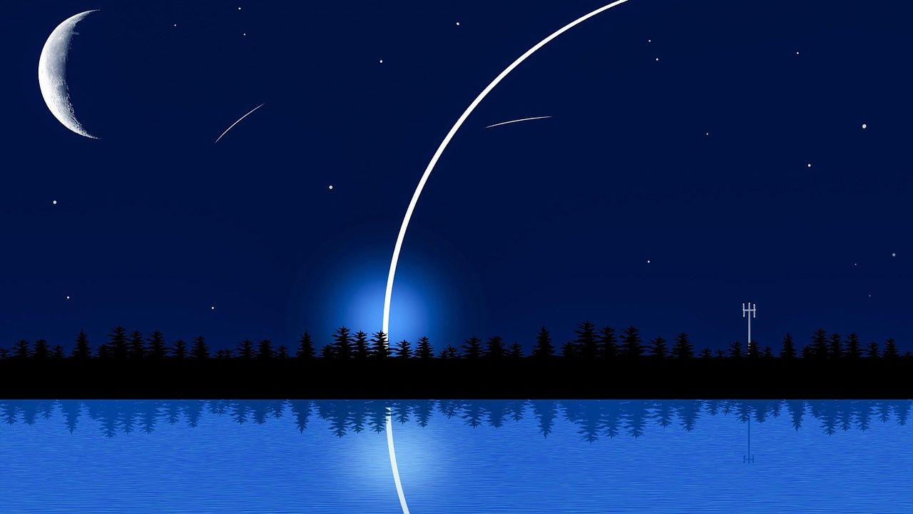 A rocket lifting off at night, illuminating surrounding launch infrastructure with bright exhaust.