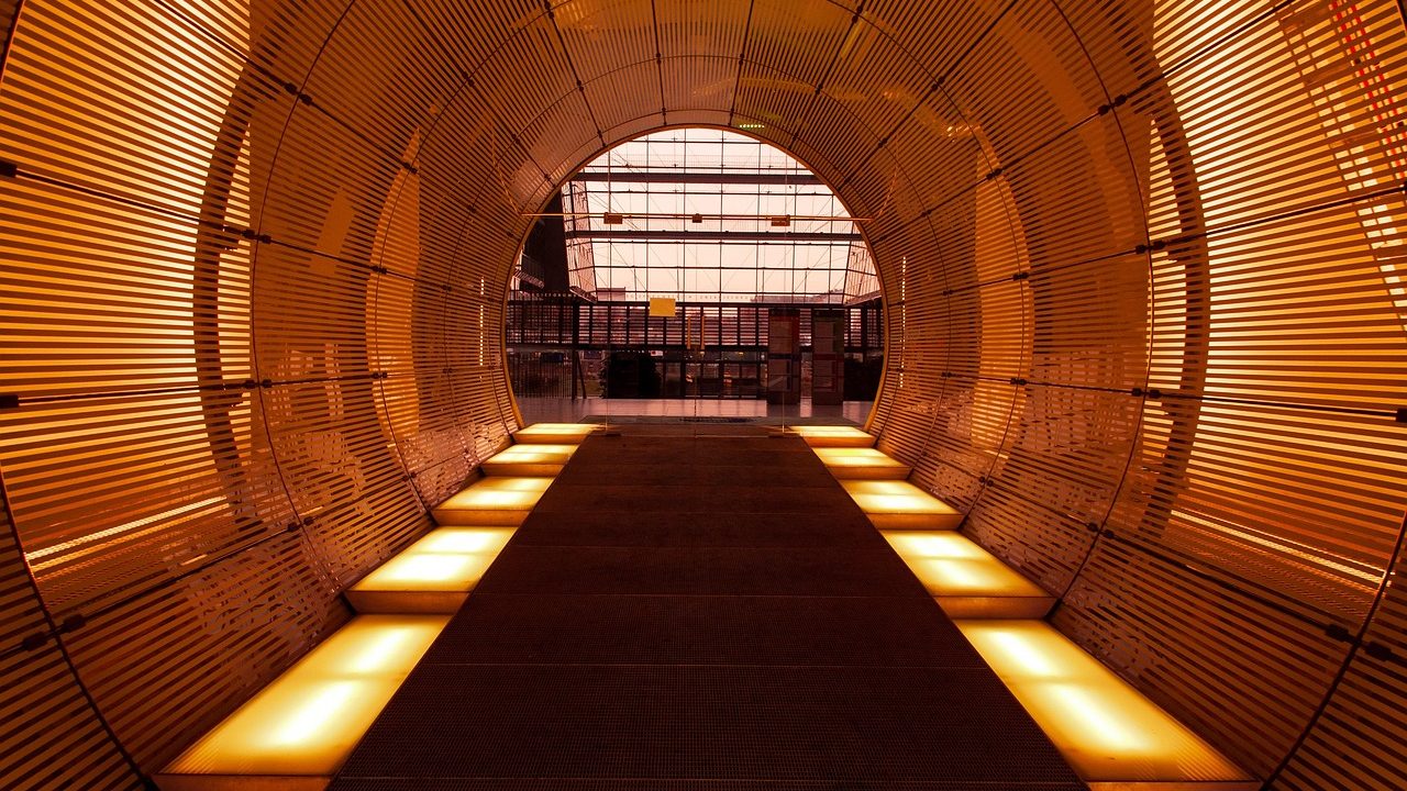 A concrete-lined underground tunnel entrance used for smuggling beneath the border.