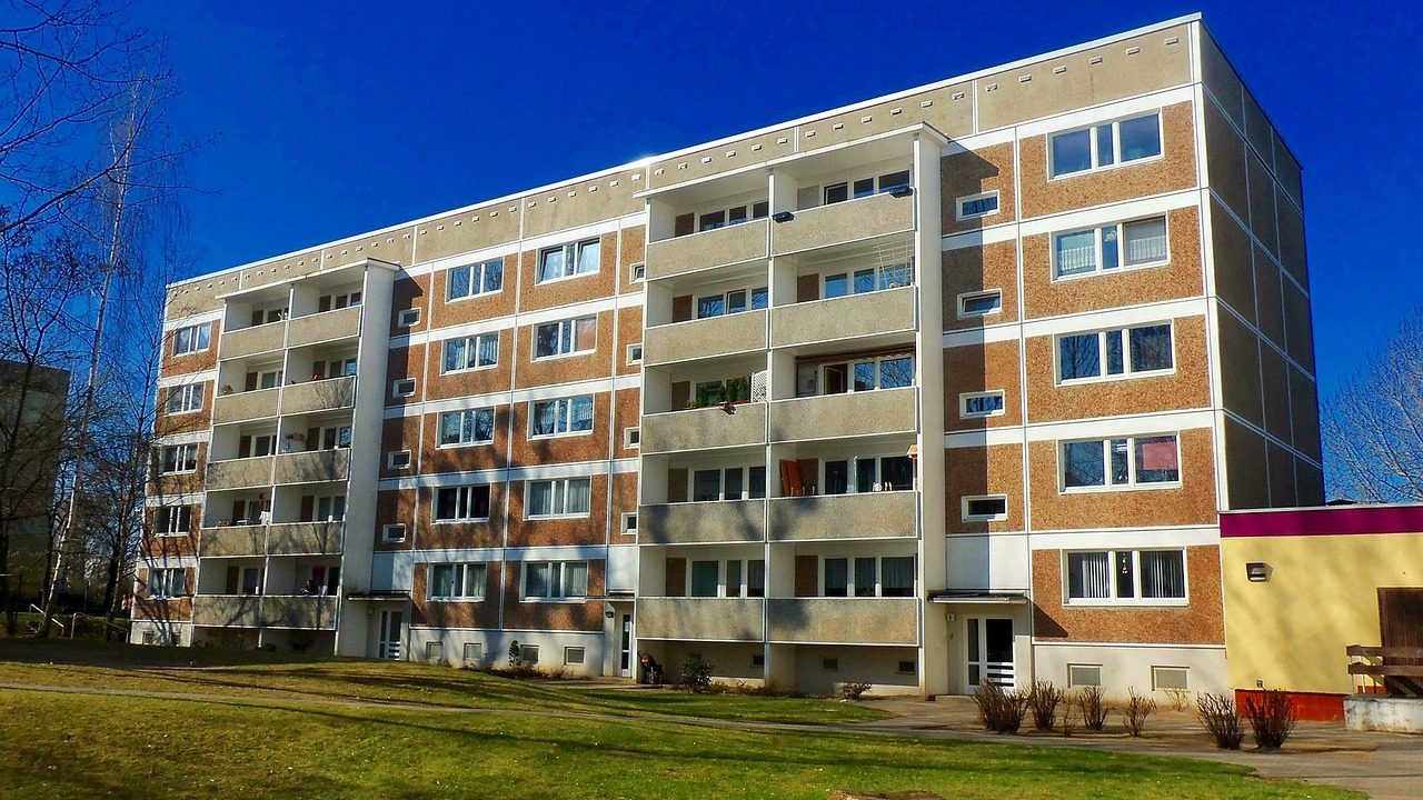 Construction workers framing a new multi-unit residential apartment building